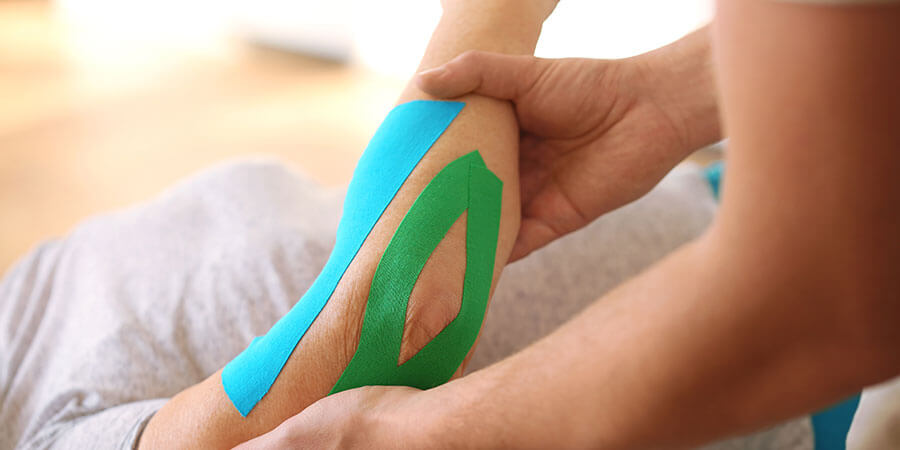Kinesiologie Luzern | Tapes am Arm und Ellenbogen